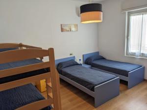Postel nebo postele na pokoji v ubytování Villa Serena