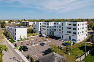 an overhead view of a parking lot with white buildings at Jude's Respite in Traverse City