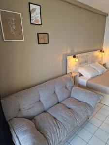 Posezení v ubytování Ti Dyaman - Studio vue mer & accès piscine gratuit + 10 fotografií