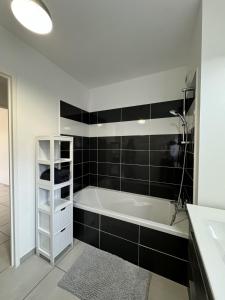 Ένα ή περισσότερα κρεβάτια σε δωμάτιο στο Chambre cosy