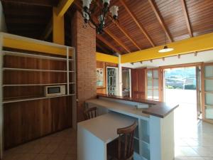 Dapur atau dapur kecil di Hospedagem Central em Rolante +33 gambar