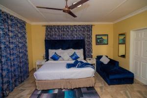 Postel nebo postele na pokoji v ubytování uPhondo Lodge + 23 fotografií