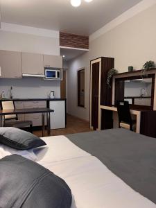 Postel nebo postele na pokoji v ubytování Pirita Beach Apartments & SPA