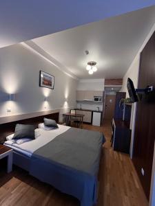 Postel nebo postele na pokoji v ubytování Pirita Beach Apartments & SPA