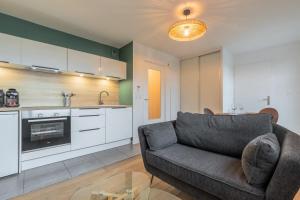 Kuchyň nebo kuchyňský kout v ubytování Appartement une chambre avec parking et terrasse