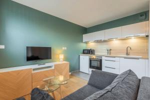 Kuchyň nebo kuchyňský kout v ubytování Appartement une chambre avec parking et terrasse