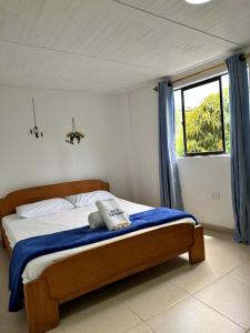 Postel nebo postele na pokoji v ubytování consorcio club Paradise