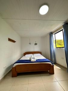 Postel nebo postele na pokoji v ubytování consorcio club Paradise