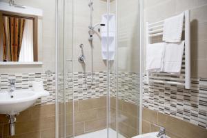 Koupelna v ubytování Hotel Silva