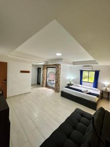 Postel nebo postele na pokoji v ubytování consorcio club Paradise
