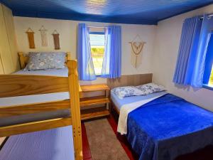 Voodi või voodid majutusasutuse Sítio Vovô Hehr, aconchegante com muito lazer nas montanhas, Domingos Martins-ES, Brasil toas +86 fotot