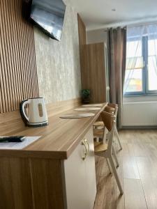 Telewizja i/lub zestaw kina domowego w obiekcie Pensjonat Zatoka 17
