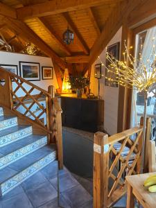 TV a/nebo společenská místnost v ubytování La Portette Chambres d'Hôtes