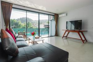 Μια τηλεόραση ή/και κέντρο ψυχαγωγίας στο Seatherny Pool Villa