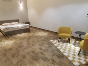 Postel nebo postele na pokoji v ubytování Camellia A