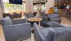 Predel za sedenje v nastanitvi Hotel Dann Cali