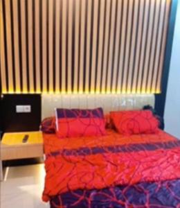 Postel nebo postele na pokoji v ubytování Delf Apartemen CPI