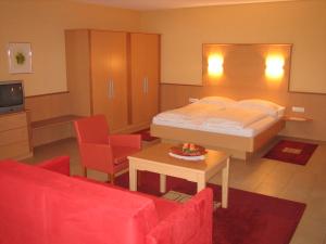 Ein Bett oder Betten in einem Zimmer der Unterkunft Hotel Cafe Lorenz