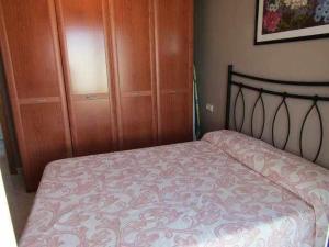 Posteľ alebo postele v izbe v ubytovaní A H RENTALS Montemar 8 apartamento + 15 fotografií