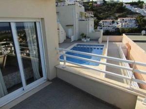 Bazén v ubytovaní A H RENTALS Montemar 8 apartamento alebo v jeho blízkosti