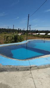 Bazén v ubytování Casa de veraneo con piscina nebo v jeho okolí