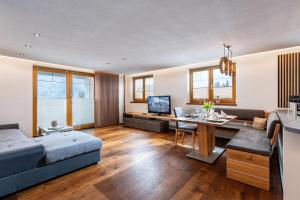 TV a/nebo společenská místnost v ubytování Appartment Steinberg