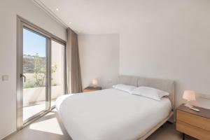 Ένα ή περισσότερα κρεβάτια σε δωμάτιο στο Pelicar 0-5 SEA VIEW 2B +33 φωτογραφίες