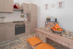 Η κουζίνα ή μικρή κουζίνα στο Casa Jerone - City Center