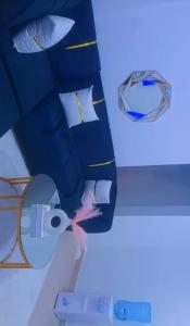 a close up of a toilet with two pillows at Homes by lucy in Mombasa +4 photos