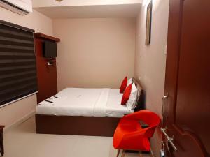 Ένα ή περισσότερα κρεβάτια σε δωμάτιο στο Hotel I-Way Residency Perungudi