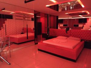 Postel nebo postele na pokoji v ubytování CAPRI Motel