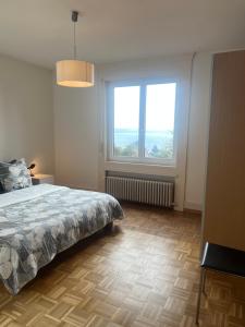 Postel nebo postele na pokoji v ubytování Alpes Rez