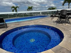 Bazén v ubytování Manaus Hotéis Millenium - suíte espelhada nebo v jeho okolí
