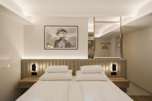 Postel nebo postele na pokoji v ubytování Hotel Schwarzer Bär + 37 fotografií