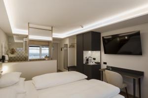 Postel nebo postele na pokoji v ubytování Hotel Schwarzer Bär