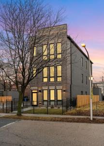 a brick building with a street light in front of it at Gilean Urban Retreat in Chicago
