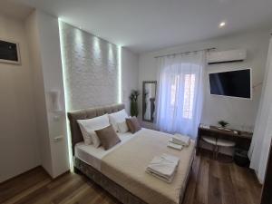 TV a/nebo společenská místnost v ubytování D&D suites in Split centre 1
