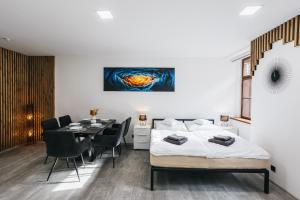 Katil atau katil-katil dalam bilik di Apartmány U Doskočilů