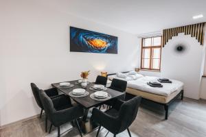 Katil atau katil-katil dalam bilik di Apartmány U Doskočilů