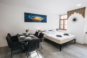 Katil atau katil-katil dalam bilik di Apartmány U Doskočilů