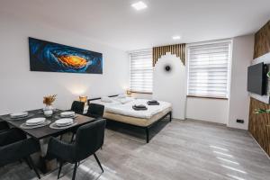 Katil atau katil-katil dalam bilik di Apartmány U Doskočilů