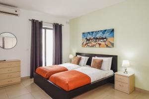 Ένα ή περισσότερα κρεβάτια σε δωμάτιο στο BH - Three Bedroom Apartment