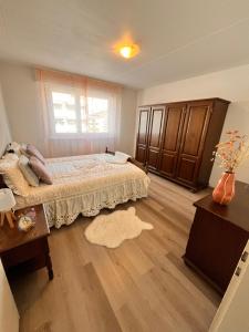 Postel nebo postele na pokoji v ubytování Monthey appartement