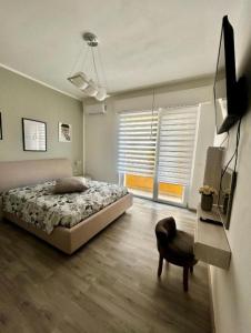 Una cama o camas en una habitación de L'approdo