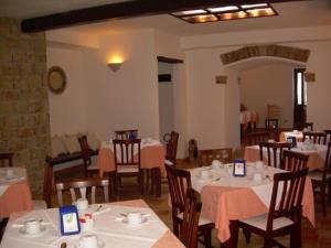 Reštaurácia alebo iné gastronomické zariadenie v ubytovaní Agriturismo Villa Luca