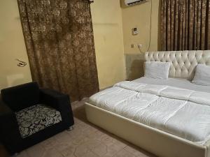 Photo de la galerie de l'établissement Yessit Homestay, à Abuja 28 autres photos