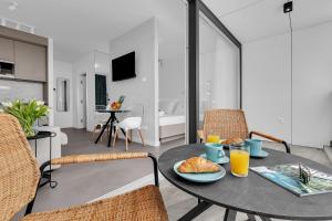 TV a/nebo společenská místnost v ubytování Perla Apartments Baska Voda + 37 fotografií