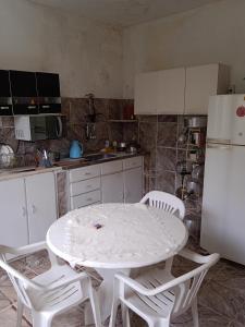 Η κουζίνα ή μικρή κουζίνα στο Hospedagem nono 2