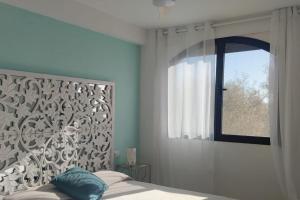 Katil atau katil-katil dalam bilik di Casa La Ribera 5