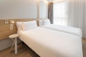B&B HOTEL Alicante Centro客房内的一张或多张床位